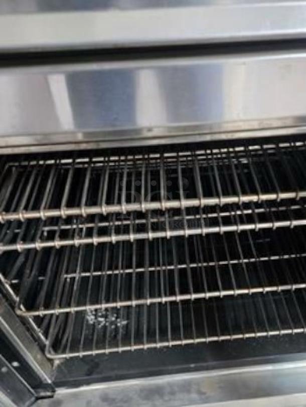 Montague EK-15A double stack electric convection oven interior, stainless steel racks, excellent condition, fully tested.