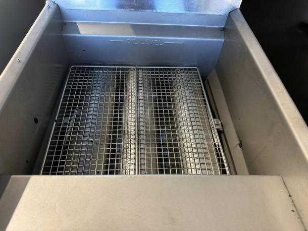 Imperial IEST-25 gas steam table, stainless steel, 65,000 BTU. Top-tier condition with visible "oil level" marking.