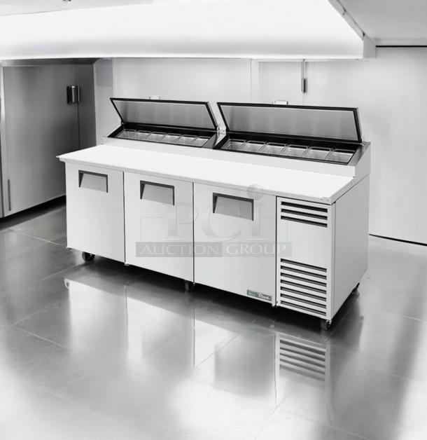 True TPP-93 3-door mega-top pizza prep table in excellent condition, fully tested, 115V, by True Manufacturing Co.