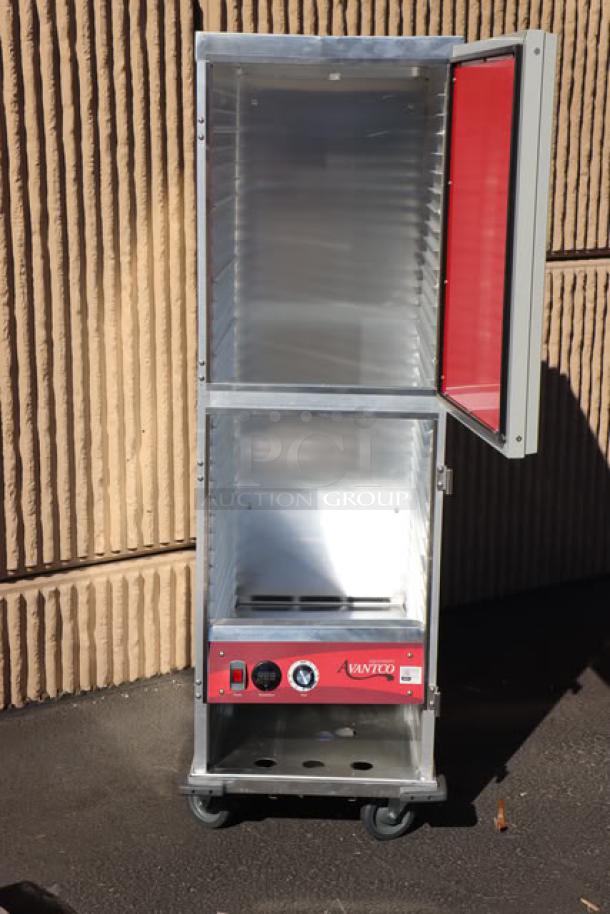 Brand new Avantco HTI-1836DS insulated heated holding cabinet with solid Dutch doors, 120V, 1,575W, on wheels.