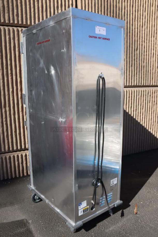 Brand new Avantco HTI-1836DS heated holding cabinet, solid Dutch doors, 120V, 1,575W, visible tags, some surface dents.