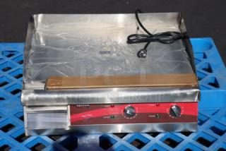Brand new Avantco EG24N 24" electric countertop griddle, 208/240V, 2675W-3560W, slight scratch-n-dent, with power cord.
