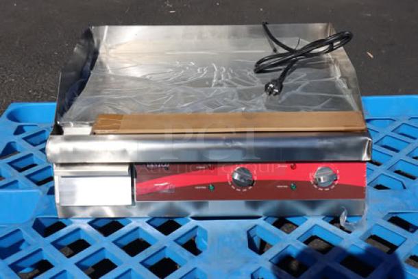 Brand new Avantco EG24N 24" electric countertop griddle, 208/240V, 2675W-3560W, shows minor cosmetic scratches.