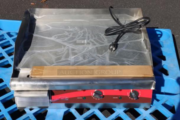 Avantco EG24N 24" electric countertop griddle, brand new condition, with protective wrap, 208/240V, 2675W-3560W.