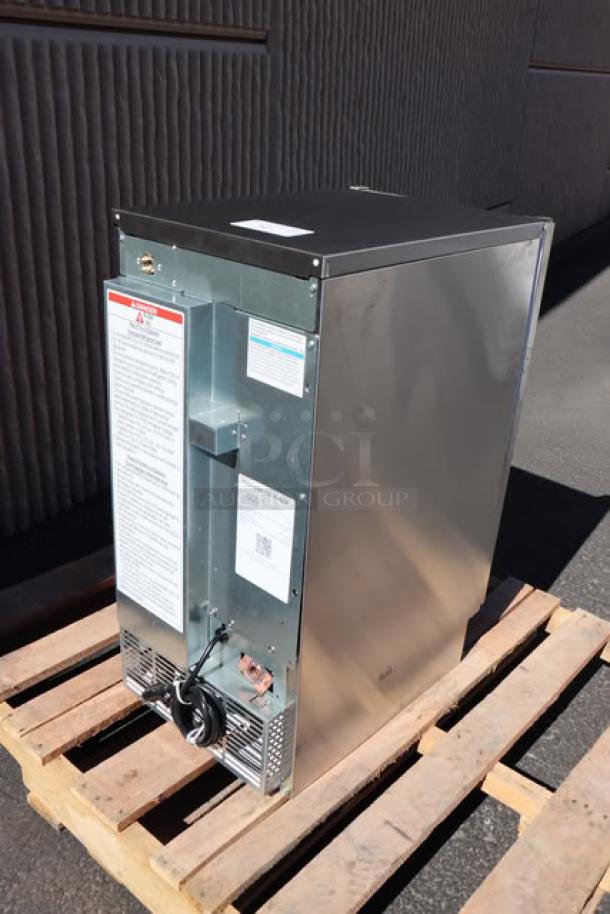 Brand new Hoshizaki C-80BAK-AD ice machine, 14 7/8" ADA compliant, 27 lb. bin, minor scratches/dents, labels with safety info.
