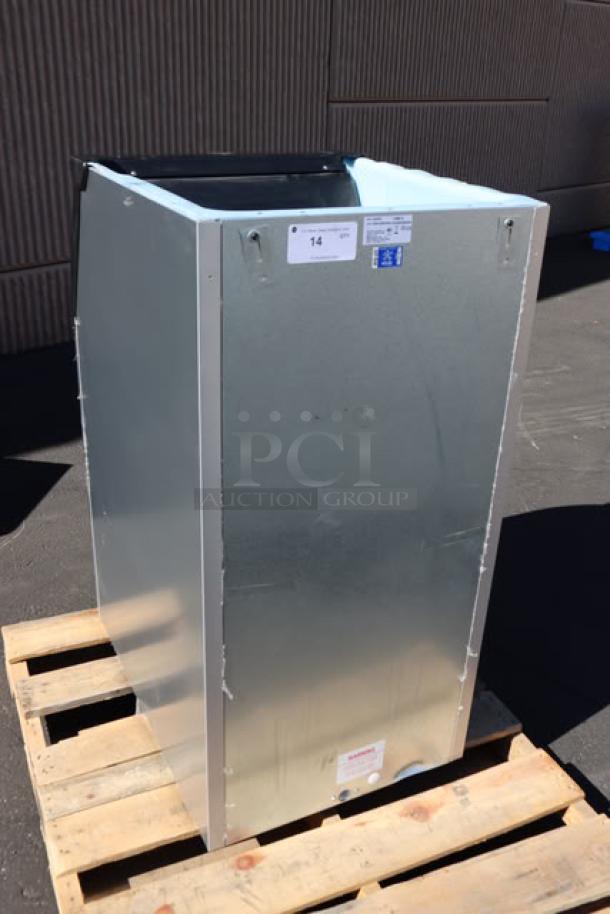 BRAND NEW Ice-O-Matic B42PSC Ice Storage Bin, 351 lb capacity, minor dents and scratches, tags visible, on pallet.