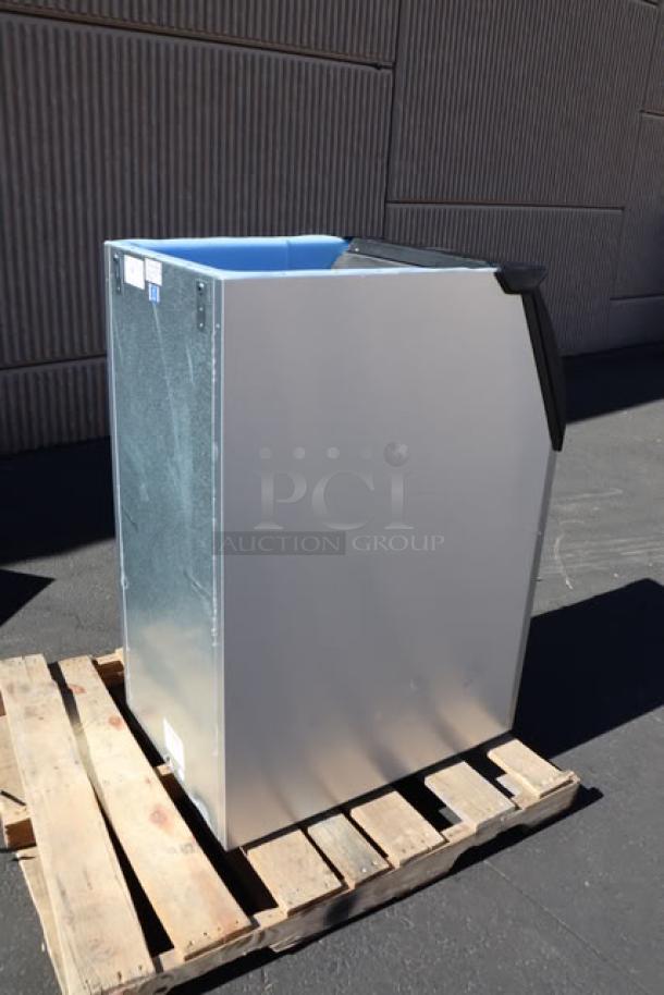 Brand new Ice-O-Matic B42PSC ice storage bin, 351 lb capacity, minor dents and scratches, no original packaging.