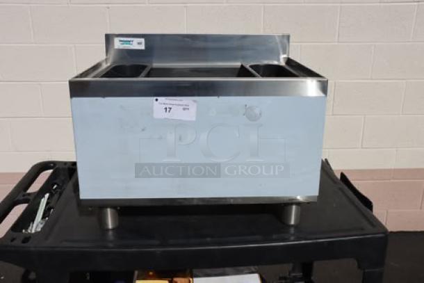 Brand new Regency 18" x 24" underbar ice bin, model 600IB1824CP, with 7 circuit cold plate, bottle holders, and slight imperfections.