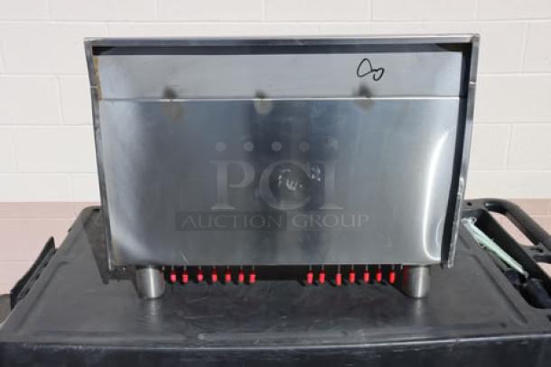 Brand new Regency 600IB1824CP underbar ice bin with 7 circuit post-mix cold plate, 18"x24", scratch-and-dent, with bottle holders.