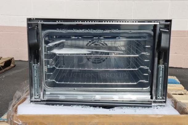 Brand new Vollrath CO4-120HS half-size countertop convection oven, 120V. Scratch-n-dent condition with visible interior racks.