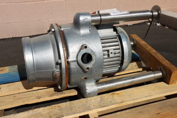 Brand new Hobart FD4/500-1 commercial garbage disposer, 5 hp, 208-230/460V, shown on pallet. Serial number: 104011867-EBB.