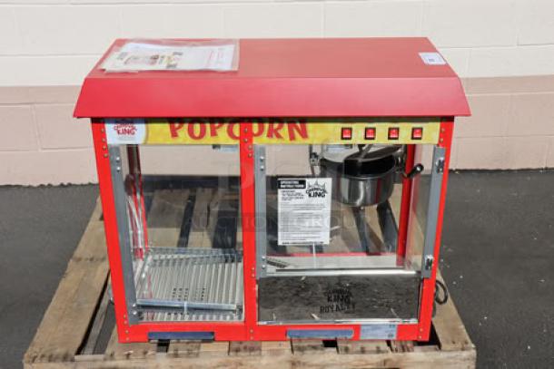 Carnival King PMW17R 8 oz. popcorn machine with warming merchandiser. Brand new, minor scratches. Serial: 2401212007.