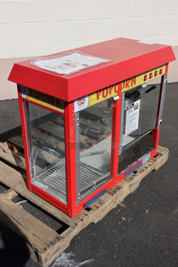 Brand new Carnival King PMW17R popcorn machine, red, with warming merchandiser, 120V, 1700W, scratch-n-dent condition.