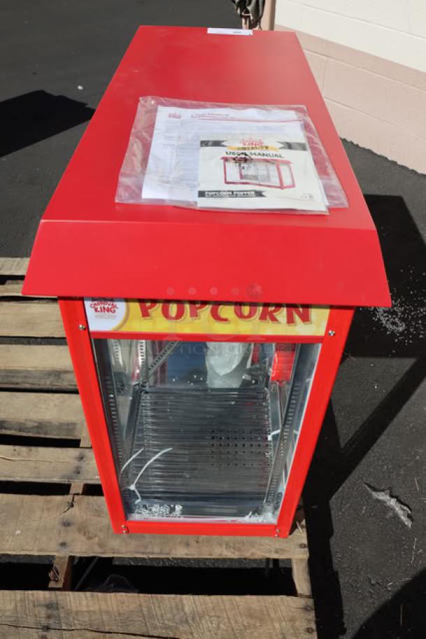 Carnival King PMW17R 8 oz. commercial popcorn machine, new condition, with user manual, features warming merchandiser.