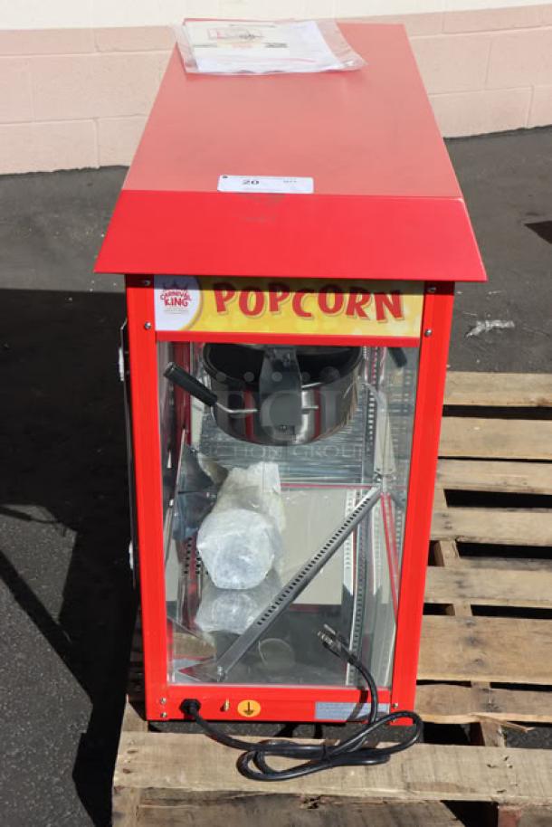 Carnival King PMW17R popcorn machine, brand new, red, 8 oz capacity, with warming merchandiser, 1700W. Serial: 2401212007.