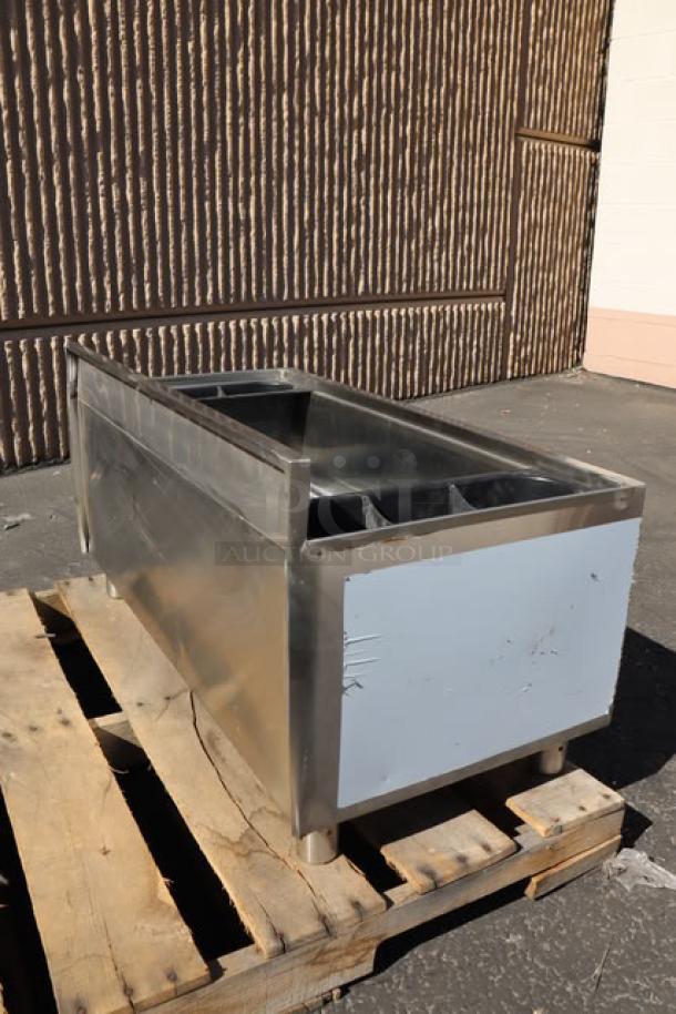 "Brand new Regency 600IB1836CP underbar ice bin with cold plate, bottle holders. Scratch-n-dent condition, stainless steel."