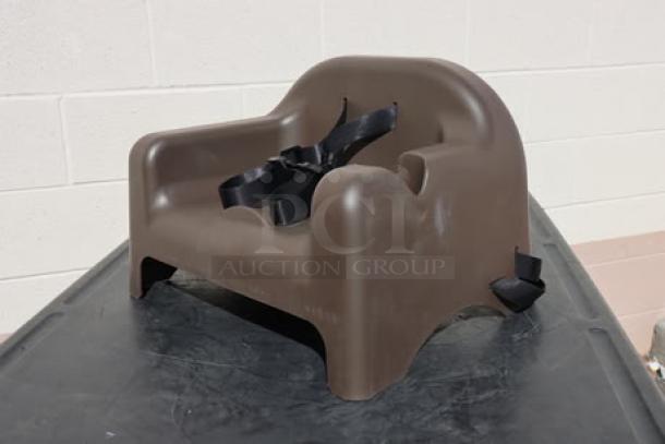 Brand new Carlisle brown polypropylene booster seat with safety strap, model 911401, set of 4.