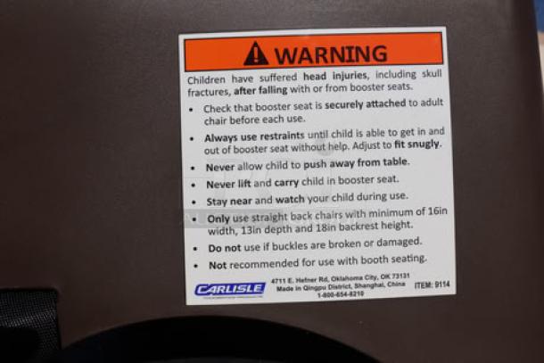 SET of 4 Carlisle 911401 Brown Polypropylene Booster Seats, brand new, with safety straps. Warning label visible.