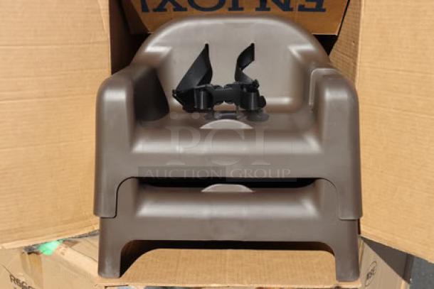 Brand new Carlisle 911401 brown polypropylene booster seat with safety strap, durable design, ideal for child seating.