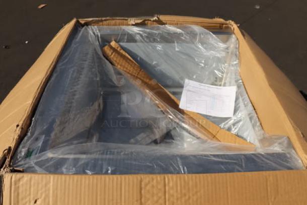 Regency 600SM242412N stainless steel mop sink, 24"x24"x12", notched front, minor scratches, in damaged packaging.