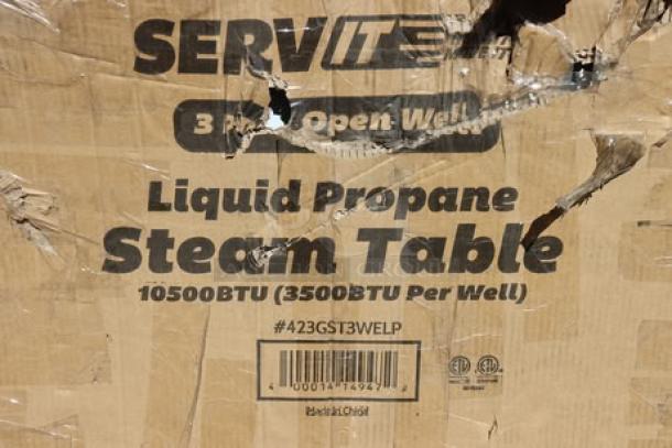 Brand new ServIt GST-3WE-LP steam table, 10,500 BTU, for liquid propane; original packaging damaged, may have scratches/dents.