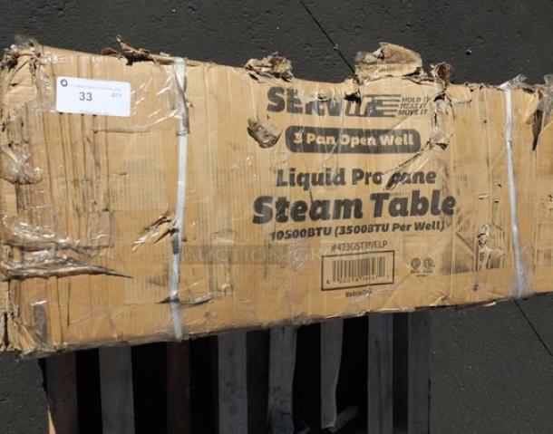 Brand new ServIt GST-3WE-LP steam table in damaged packaging, potential scratches/dents, 10,500 BTU, three-pan capacity.
