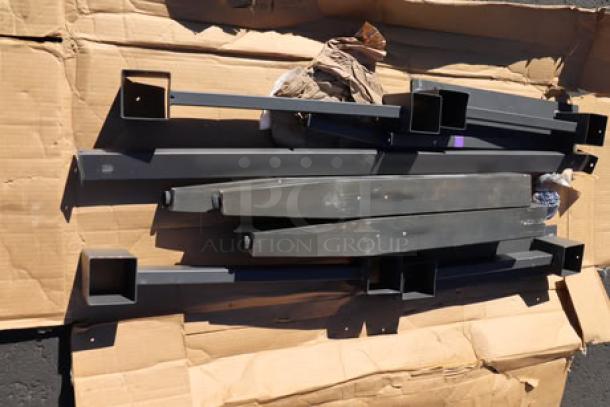 Brand new Lancaster Table & Seating industrial slate gray trestle table base, model 349TB72GRY30, in damaged packaging.