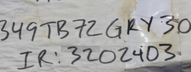 Lancaster Table & Seating 349TB72GRY30 label showing model and IR number. Original packaging is damaged.