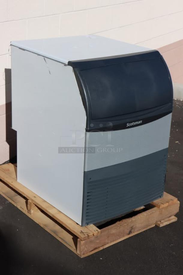 BRAND NEW Scotsman UC2024MA-1 Ice Machine, air-cooled, 227 lb. capacity, minor dents. Includes ice scoop. S/N: 25071320013380.