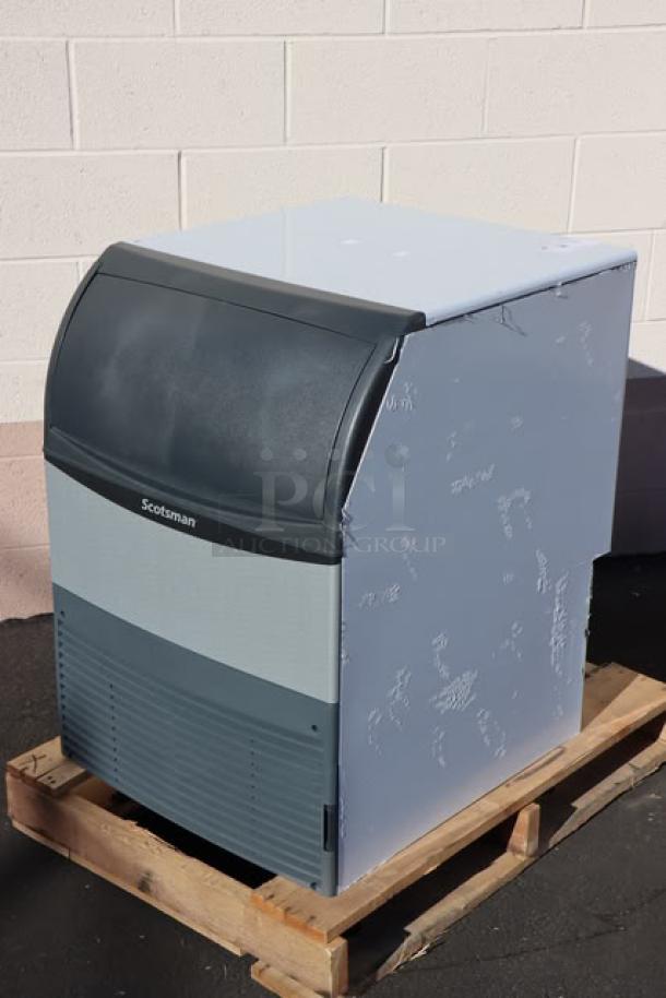 Scotsman UC2024MA-1 undercounter ice machine, 227 lb capacity, air-cooled, 115v, minor exterior dents/scratches. Includes ice scoop.