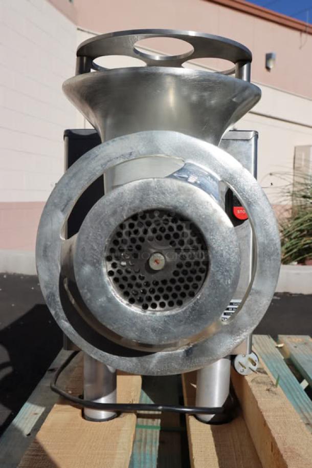 ProCut KG-22-W-XP #22 electric meat grinder, dented on left, includes auger, knife, pusher, grinder plates. 220V, 2 hp.