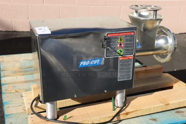 ProCut KG-22-W-XP #22 electric meat grinder, 220V, 2 hp, with dent on left side. Includes auger, knife, pusher, plates.