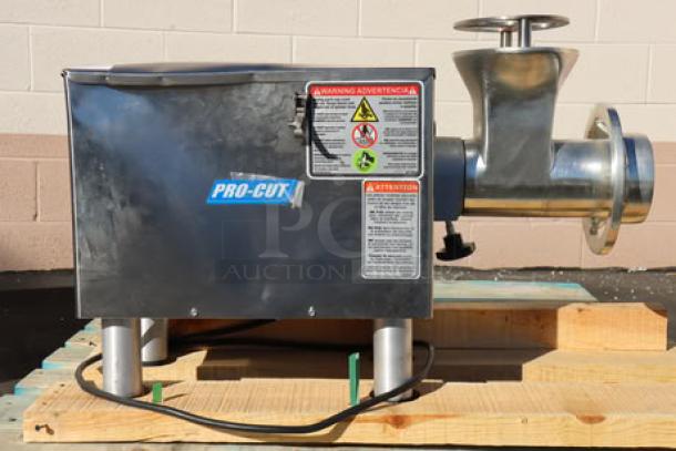 ProCut KG-22-W-XP #22 electric meat grinder, 220V, 2 hp, with safe guard; dent on left side, includes auger, knife, pusher, plates.