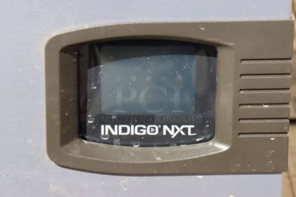 Manitowoc IDT1500A Indigo NXT ice machine display with minor scratches, 1668 lb capacity, air-cooled, model visible.