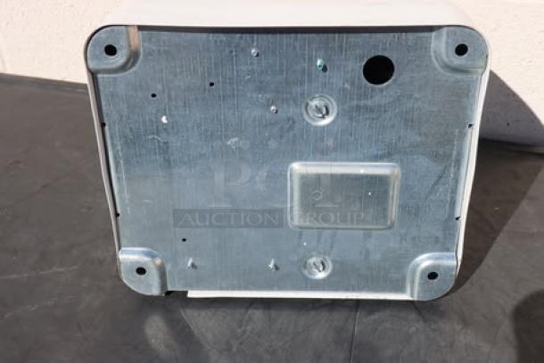 AMERICAN DRYER DR-10N hand dryer, steel push button, white enamel finish, 120V, 15A, serial IJ09, bottom view.