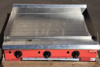 Avantco CAG-15-TG 15" countertop gas griddle, new scratch-n-dent. Stainless steel, thermostatic controls, 35,000 BTU.