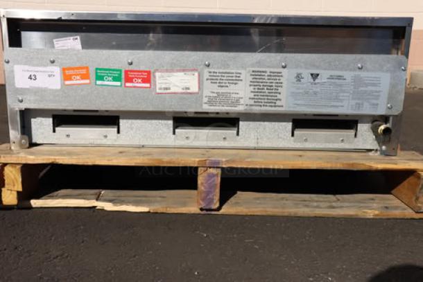 Avantco CAG-15-TG gas griddle, 15", 35,000 BTU, new scratch-n-dent condition. Features thermostatic controls. Visible safety labels.