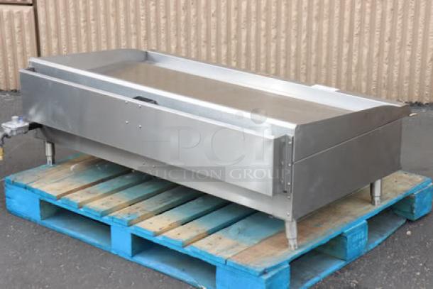 Cooking Performance Group GM-CPG-48-NL 48" gas countertop griddle, manual controls, stainless steel, used condition.