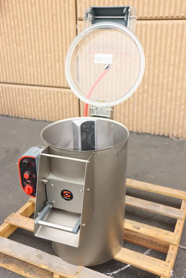 Brand new Sammic PI-20 potato peeler, 44 lb capacity, 120V, 3/4 hp, minor scratches and dents, open lid on a pallet.
