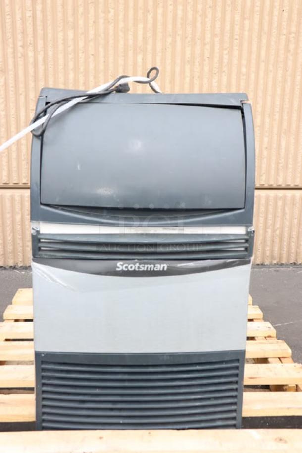 Brand new Scotsman UN1520A-1A undercounter nugget ice machine, 57 lb. bin, 20" air-cooled, 115V, with minor scratches.