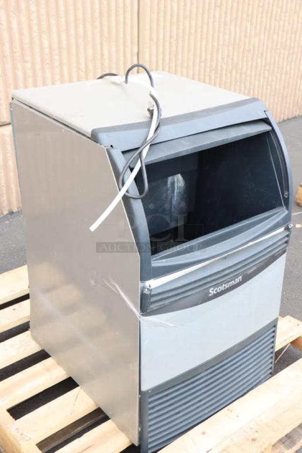 Scotsman UN1520A-1A nugget ice machine, air-cooled, scratch-n-dent, 57 lb. bin, 115V, new condition, S/N: 21101320015648.