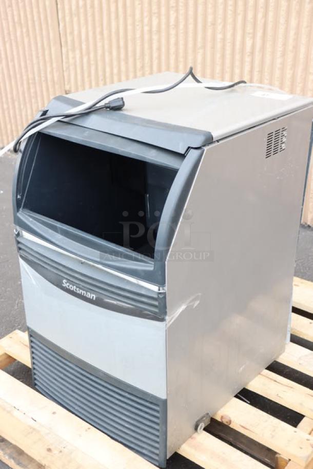 Scotsman UN1520A-1A air-cooled undercounter nugget ice machine, brand new with minor scratches, 57 lb. bin capacity, 115V.