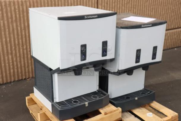 Two new Scotsman HID525AB-1 Meridian countertop ice machines with water dispensers. Air-cooled, 25 lb storage, push-button.