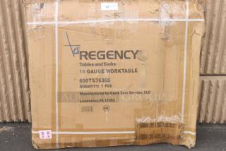 Sealed Regency 600TS3636S work table box, 16-gauge stainless steel, packaging damaged, potential light scratches/dents.