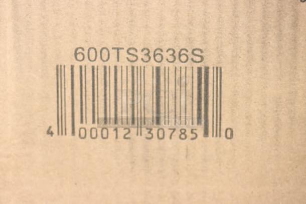 Sealed box labeled "600TS3636S" with barcode, containing Regency 36"x36" stainless steel work table. Packaging damaged.