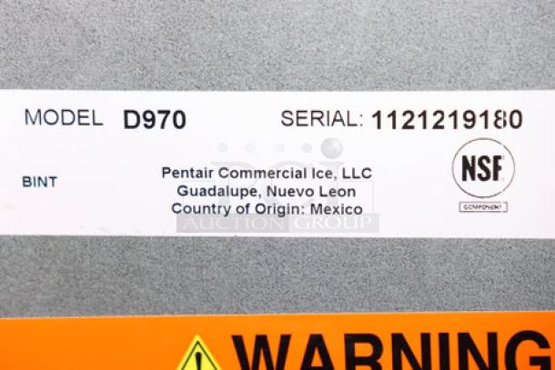 Brand new Manitowoc D970 Ice Storage Bin, 882 lb capacity, serial 1121219180, scratch-and-dent condition. NSF certified.
