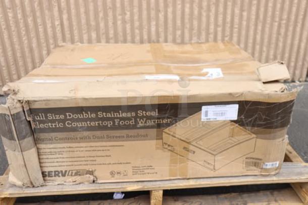 Brand new ServIt FW200D electric food warmer in original, damaged packaging. Dual well, digital controls, 120V, 2000W.