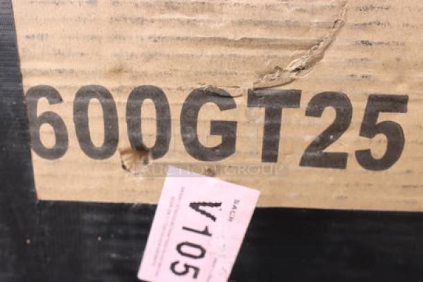 Alt text: Damaged packaging with visible "600GT25" marking and auction tag indicating Regency 600GT25 50 lb. grease trap.