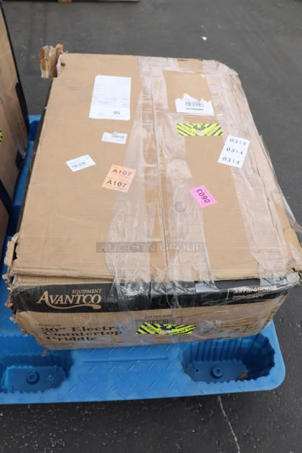 Brand new Avantco EG30N 30" electric countertop griddle in damaged original packaging; unit may have minor scratches/dents.