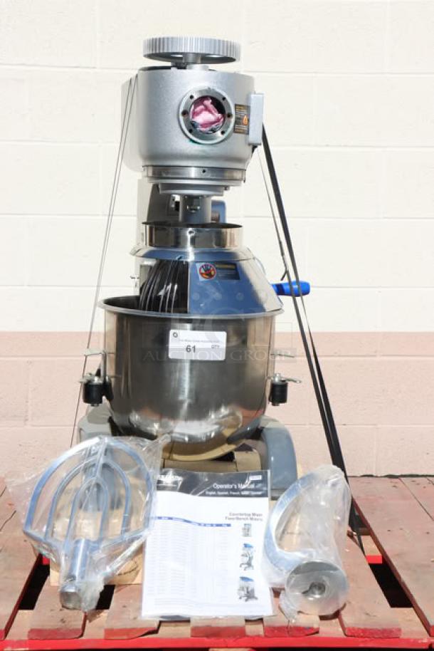Vollrath 40757 20 Qt. Planetary Stand Mixer, 120V, 1/2 hp, with guard, attachments, and manual; mixer damaged, parts usable.